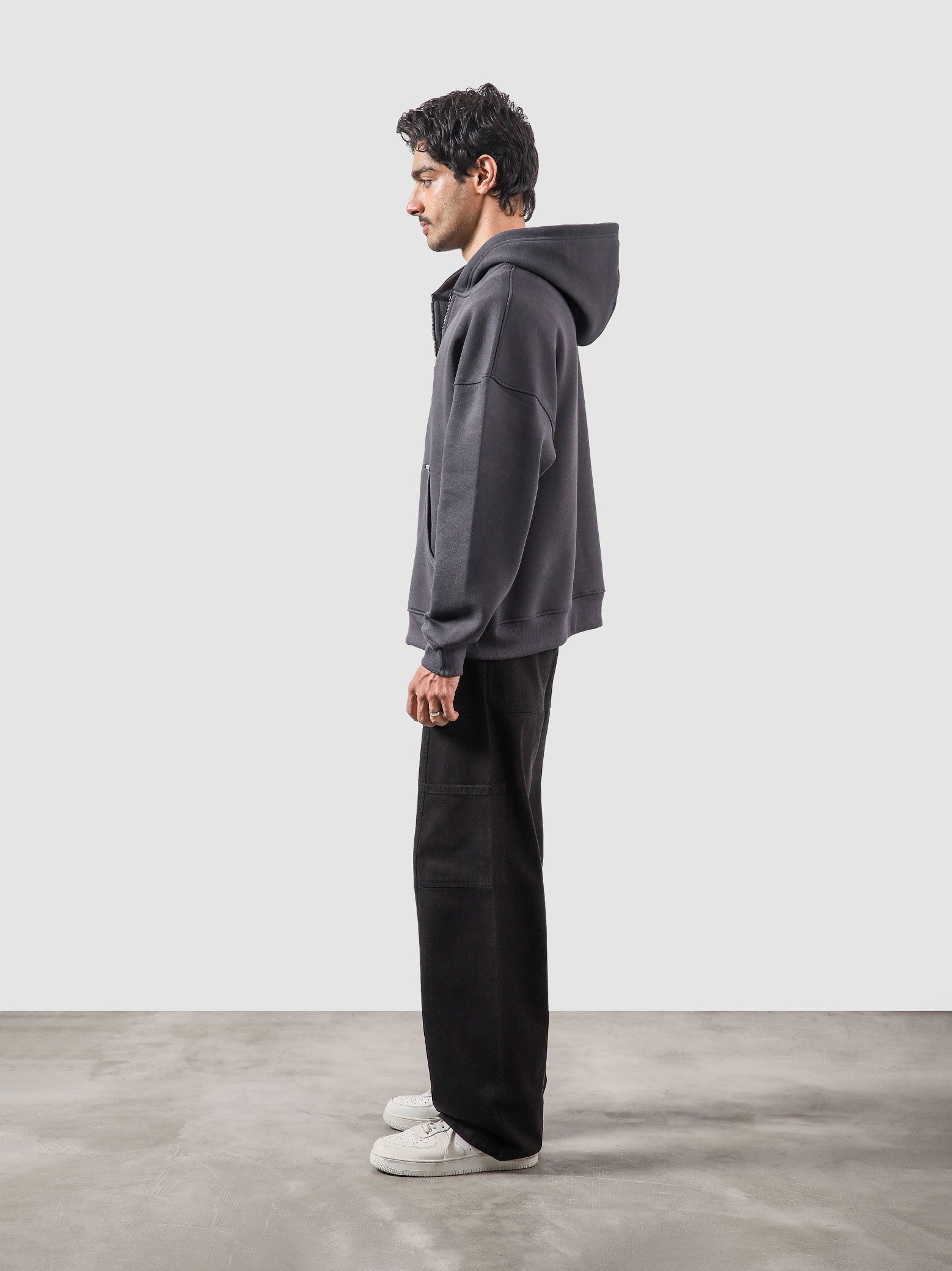 Granite essential zipper hoodie male model side view full body Pakistan – GROOVY