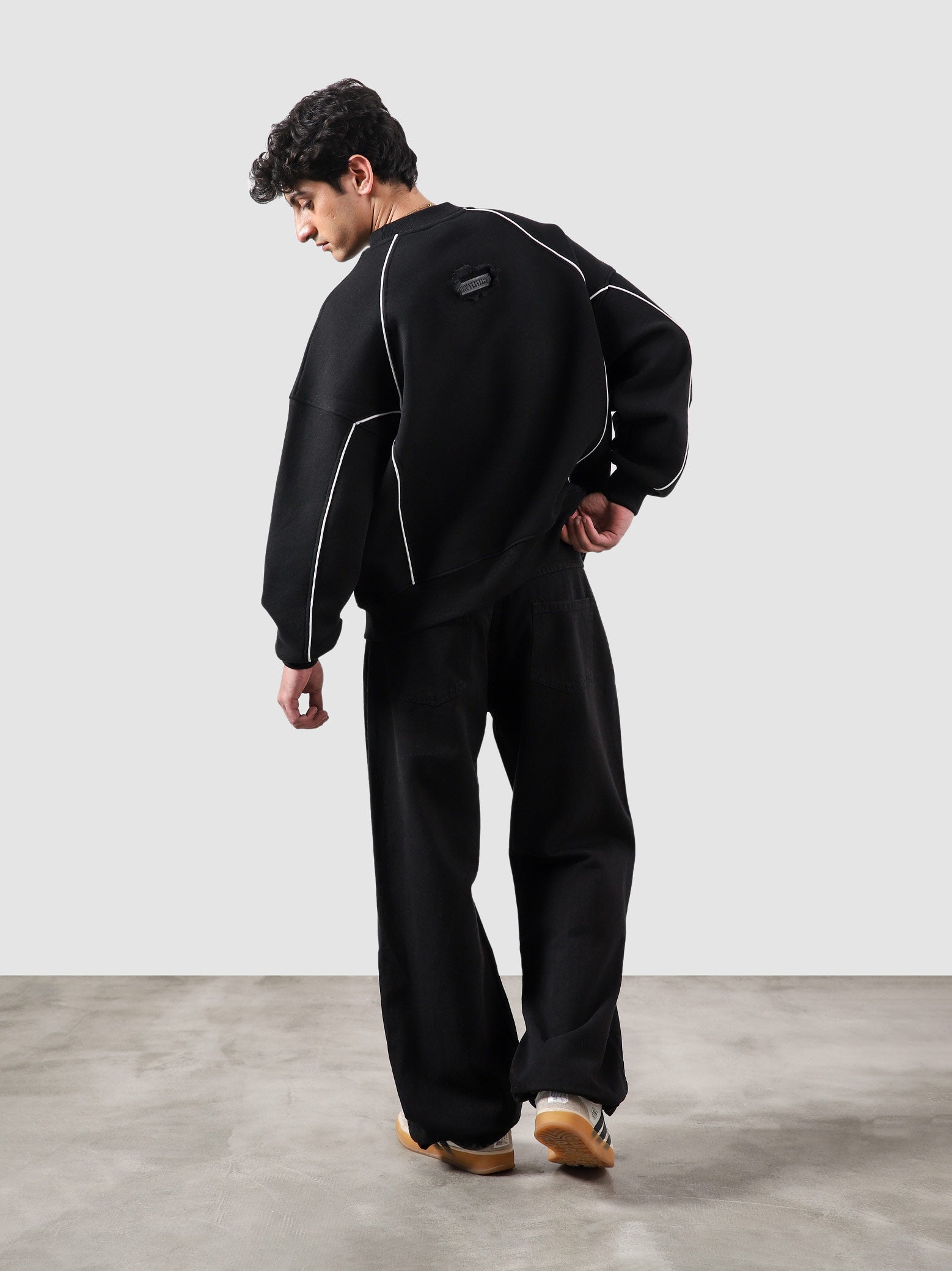 Hidden In Plain Sight black sweatshirt male model side angle oversized Pakistan – GROOVY