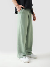 Sage green baggy trousers male model side view full body streetwear Pakistan – GROOVY