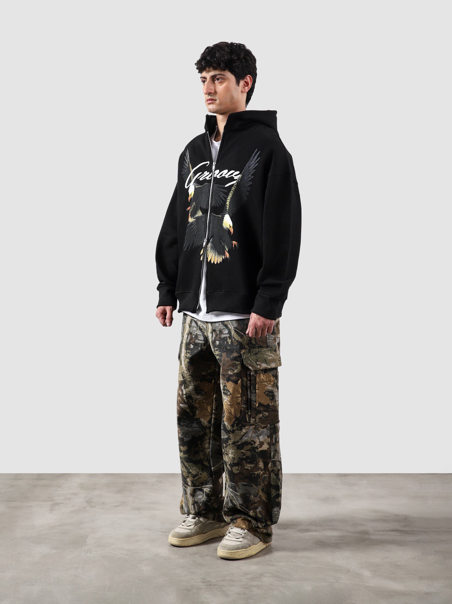 Flying Predator zipper hoodie male model side view full body Pakistan – GROOVY