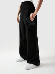 Utility V1 black cargos male model side view full body Pakistan – GROOVY