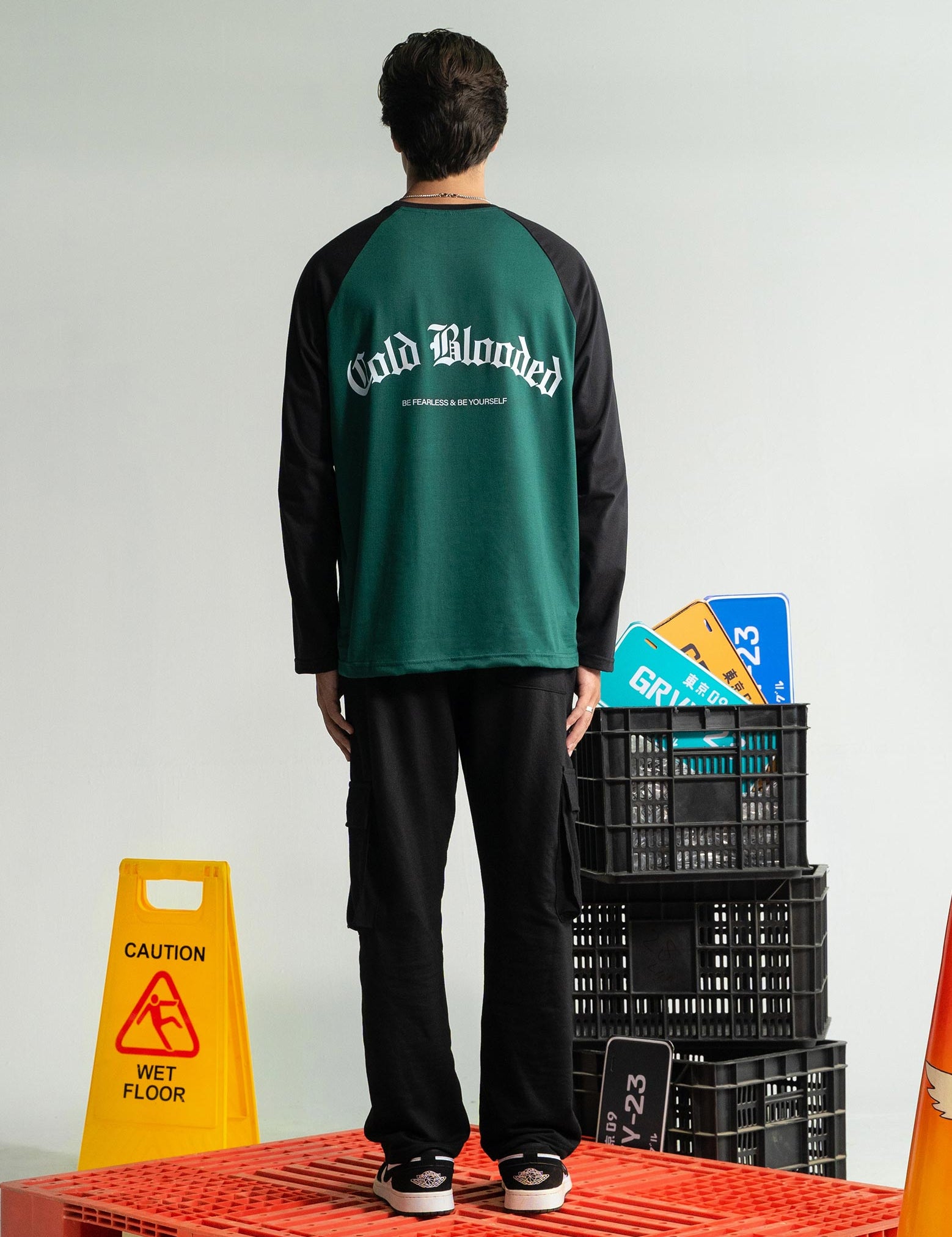 Cold Blooded Green raglan tee male model back view green black contrast sleeve Pakistan – GROOVY