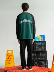 Cold Blooded Green raglan tee male model back view green black contrast sleeve Pakistan – GROOVY