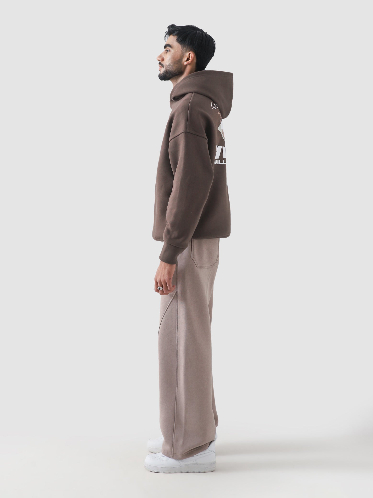 Never Stopping Culture hoodie male model side view oversized chocolate brown Pakistan – GROOVY