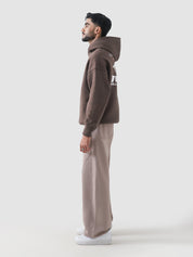 Never Stopping Culture hoodie male model side view oversized chocolate brown Pakistan – GROOVY
