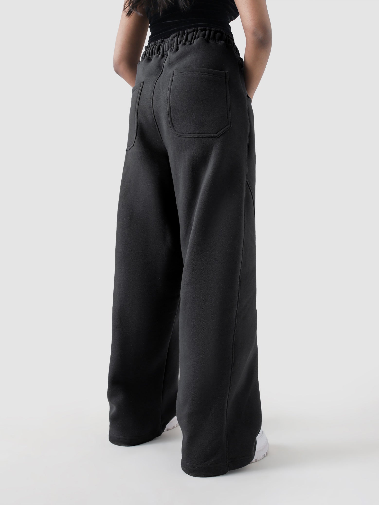 Unity VI black winter trouser male model side view full body Pakistan – GROOVY