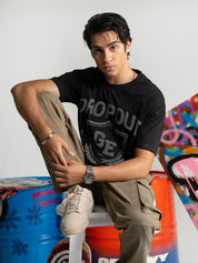 Black Graphic Tee Male Model Side Angle – Dropout – GROOVY Pakistan