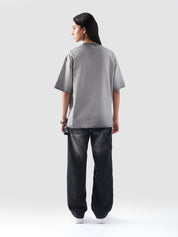 Oil fade washed tee male model side angle experimental wash Pakistan – GROOVY