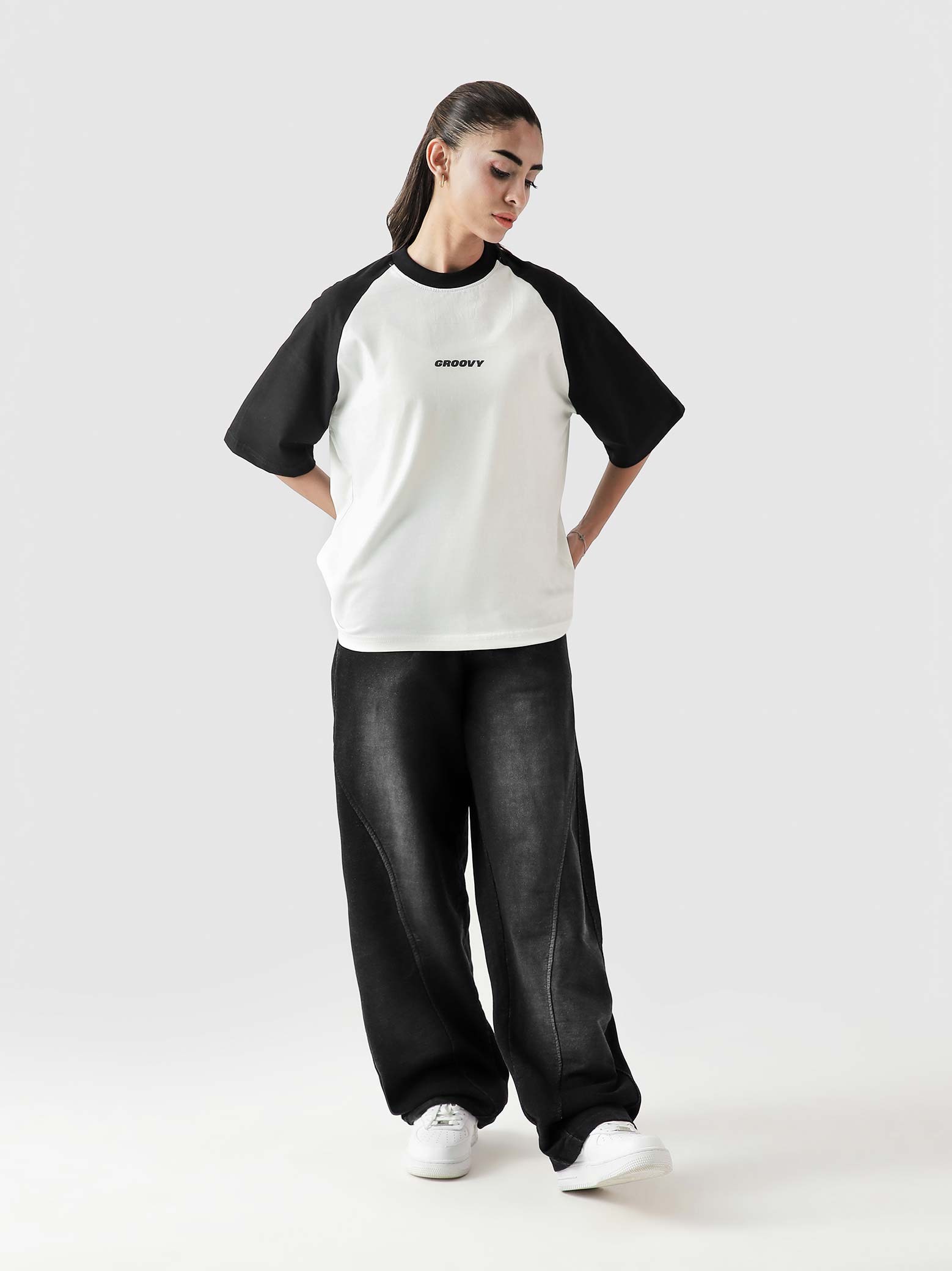 CORE tees black raglan male model full body front view contrast sleeves Pakistan – GROOVY