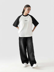 CORE tees black raglan male model full body front view contrast sleeves Pakistan – GROOVY