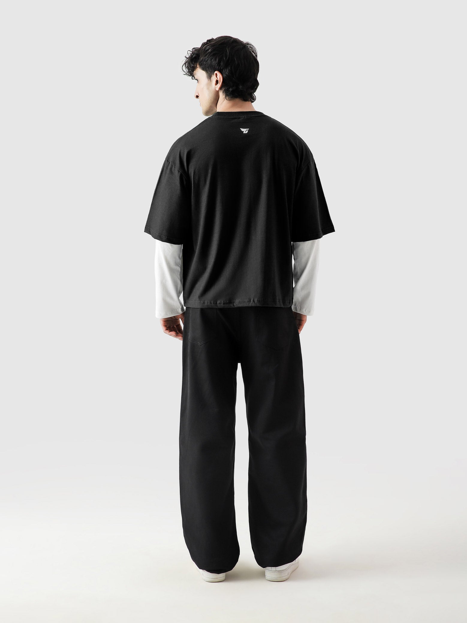 96 Double Layer Jersey black male model side view oversized layered Pakistan – GROOVY
