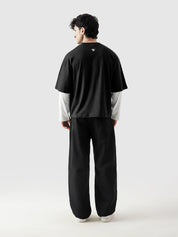 96 Double Layer Jersey black male model side view oversized layered Pakistan – GROOVY
