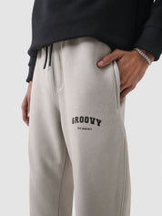Chalk essential trouser male model side view full body streetwear Pakistan – GROOVY