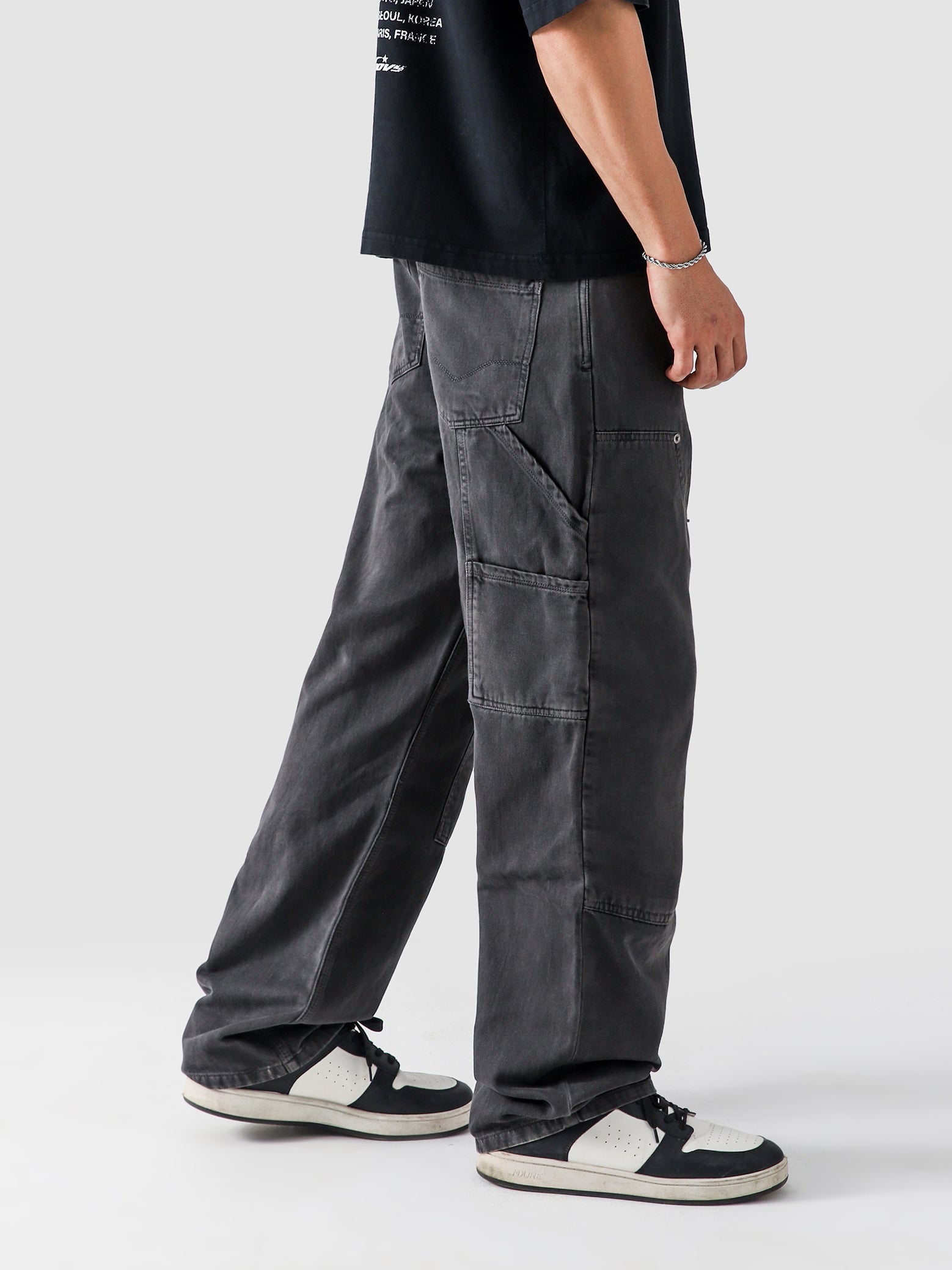 Dark grey carpenter denim male model back view full body Pakistan – GROOVY