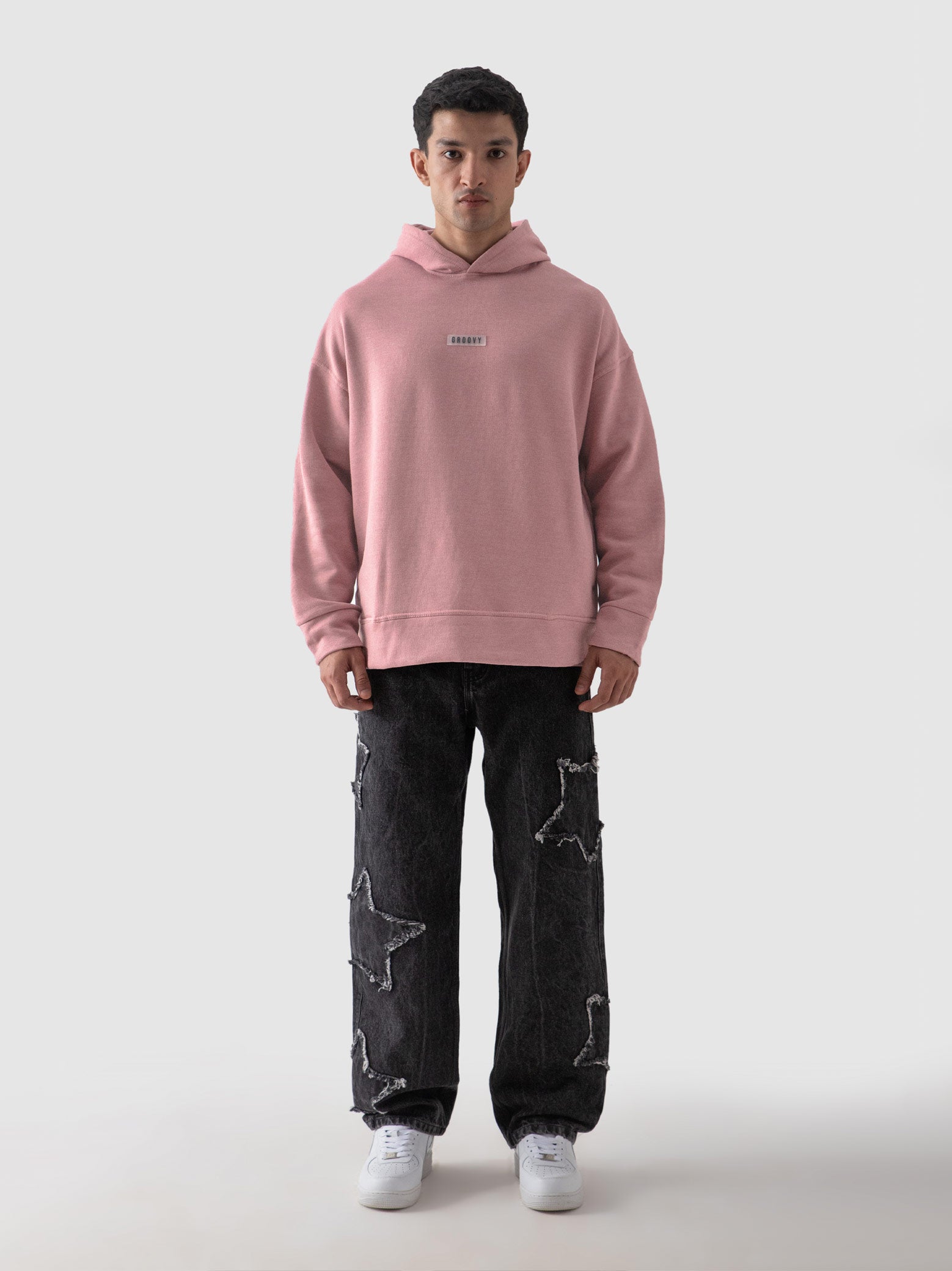 Pastel pink hoodie male model side view full body Pakistan – GROOVY