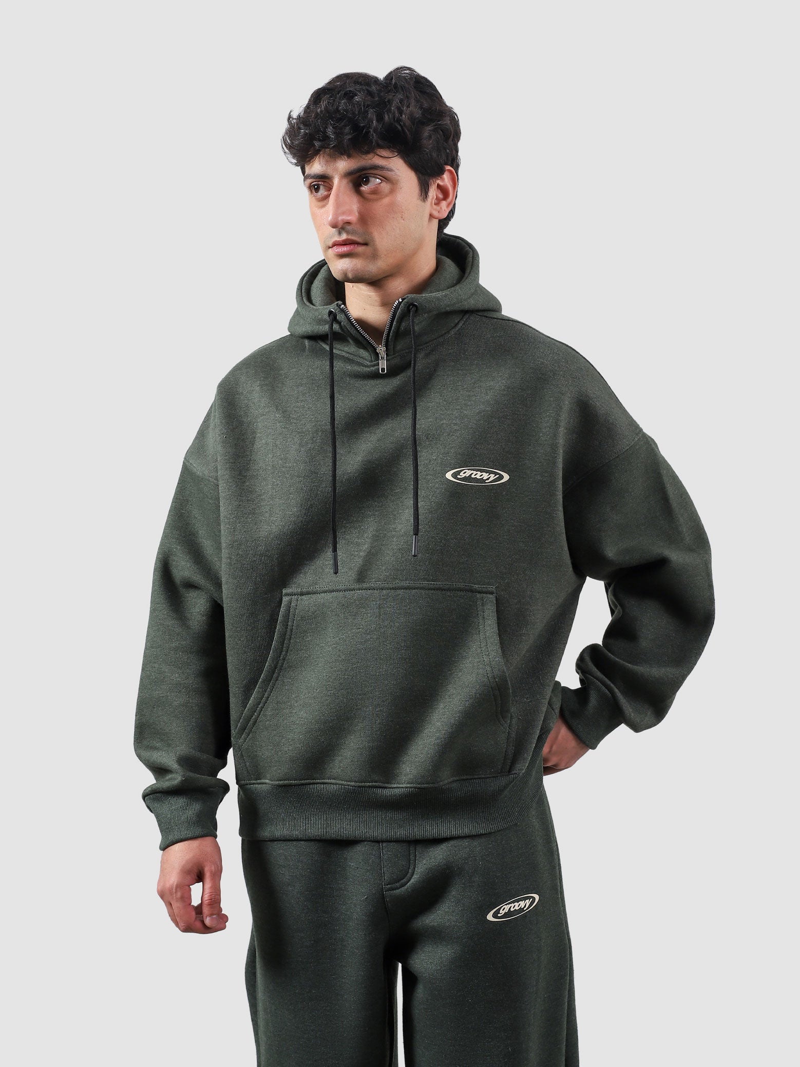 Utility Top heather green female model front view oversized hoodie Pakistan – GROOVY