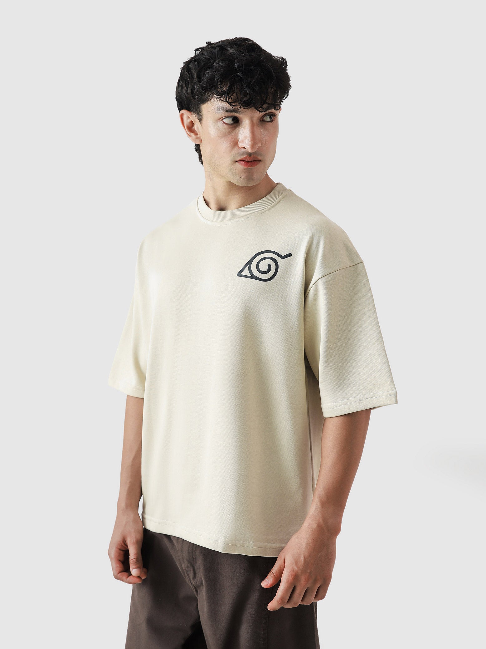 Naruto Uzumaki tee male model side angle beige anime oversized Pakistan – GROOVY