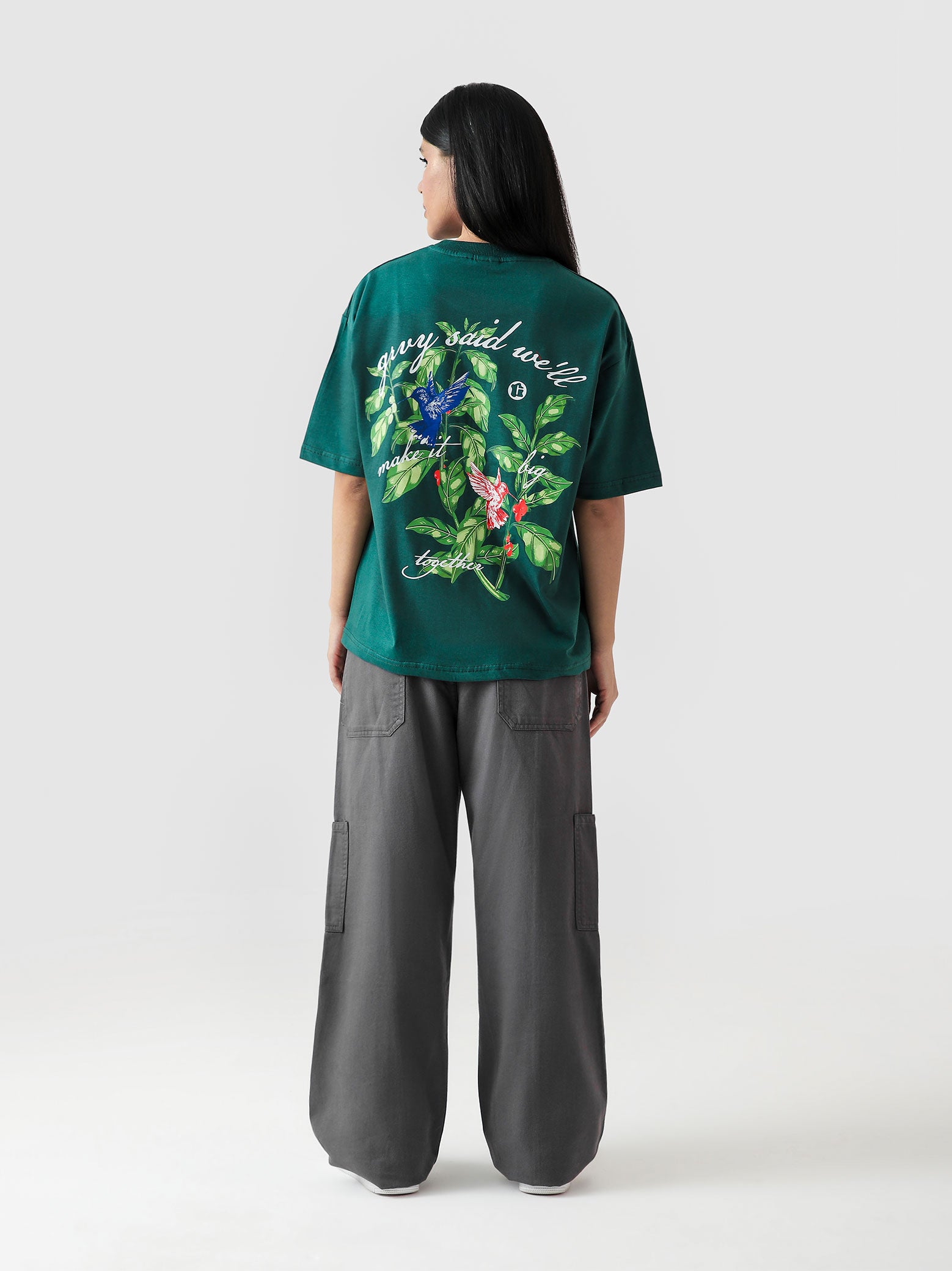 Green Hummingbird tee male model side angle Pakistan – GROOVY