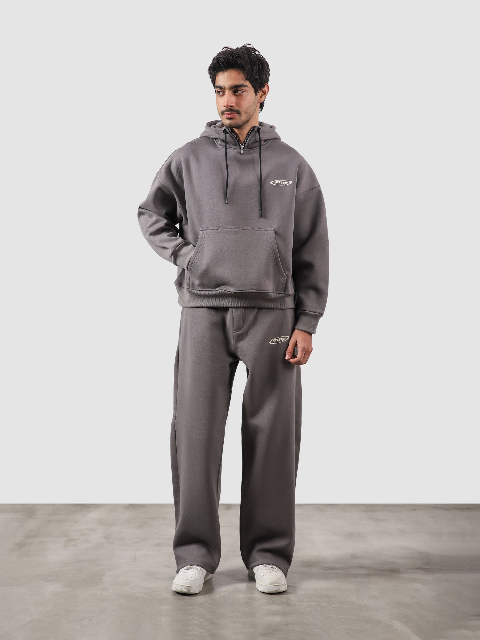 Utility Top granite grey female model front view oversized hoodie Pakistan – GROOVY