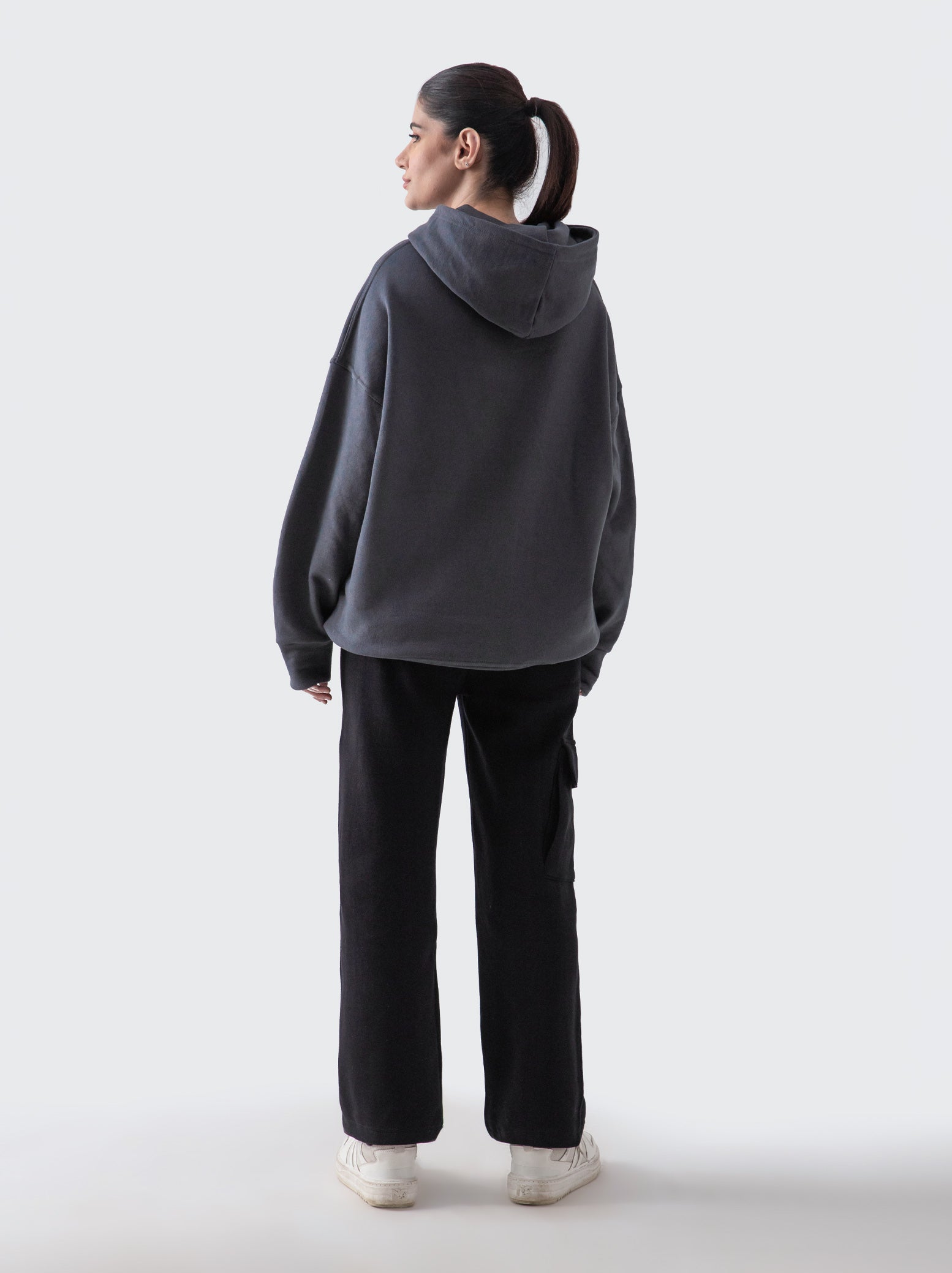 Dark grey hoodie male model side view full body Pakistan – GROOVY