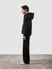 Black essential zipper hoodie female model front view oversized Pakistan – GROOVY