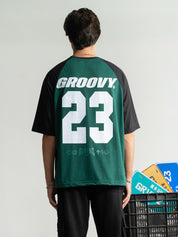 Athletic Department Raglan female model front view deep green black Pakistan – GROOVY