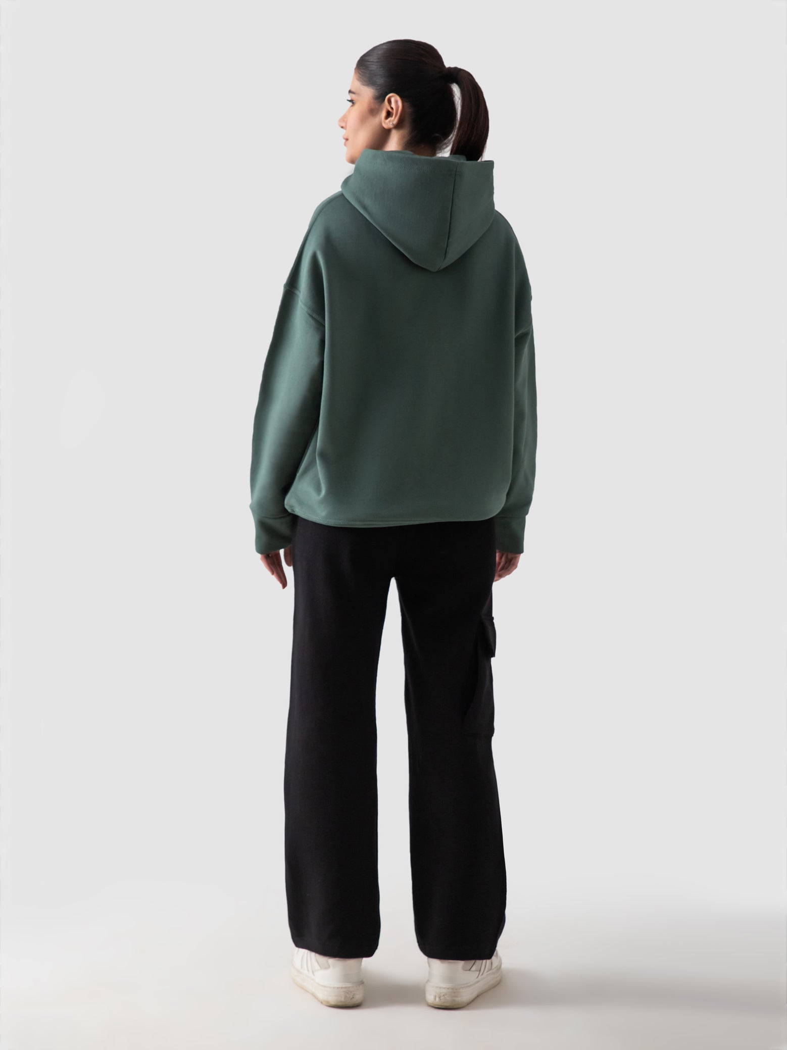 Hunter green hoodie female model front view oversized streetwear Pakistan – GROOVY