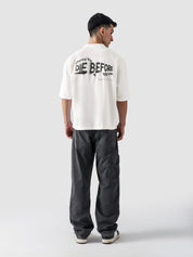 White Oversized Tee Female Model Front View – GROOVY Studios – GROOVY Pakistan