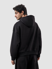 Utility Top black female model front view oversized hoodie Pakistan – GROOVY