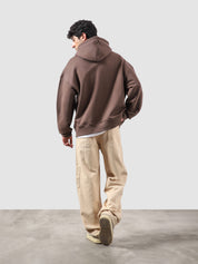 Maple brown essential zipper hoodie female model front view oversized Pakistan – GROOVY