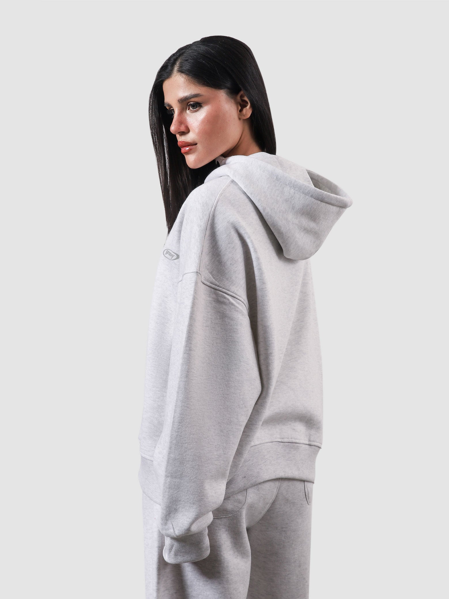 Utility Top arctyc white female model front view oversized hoodie Pakistan – GROOVY