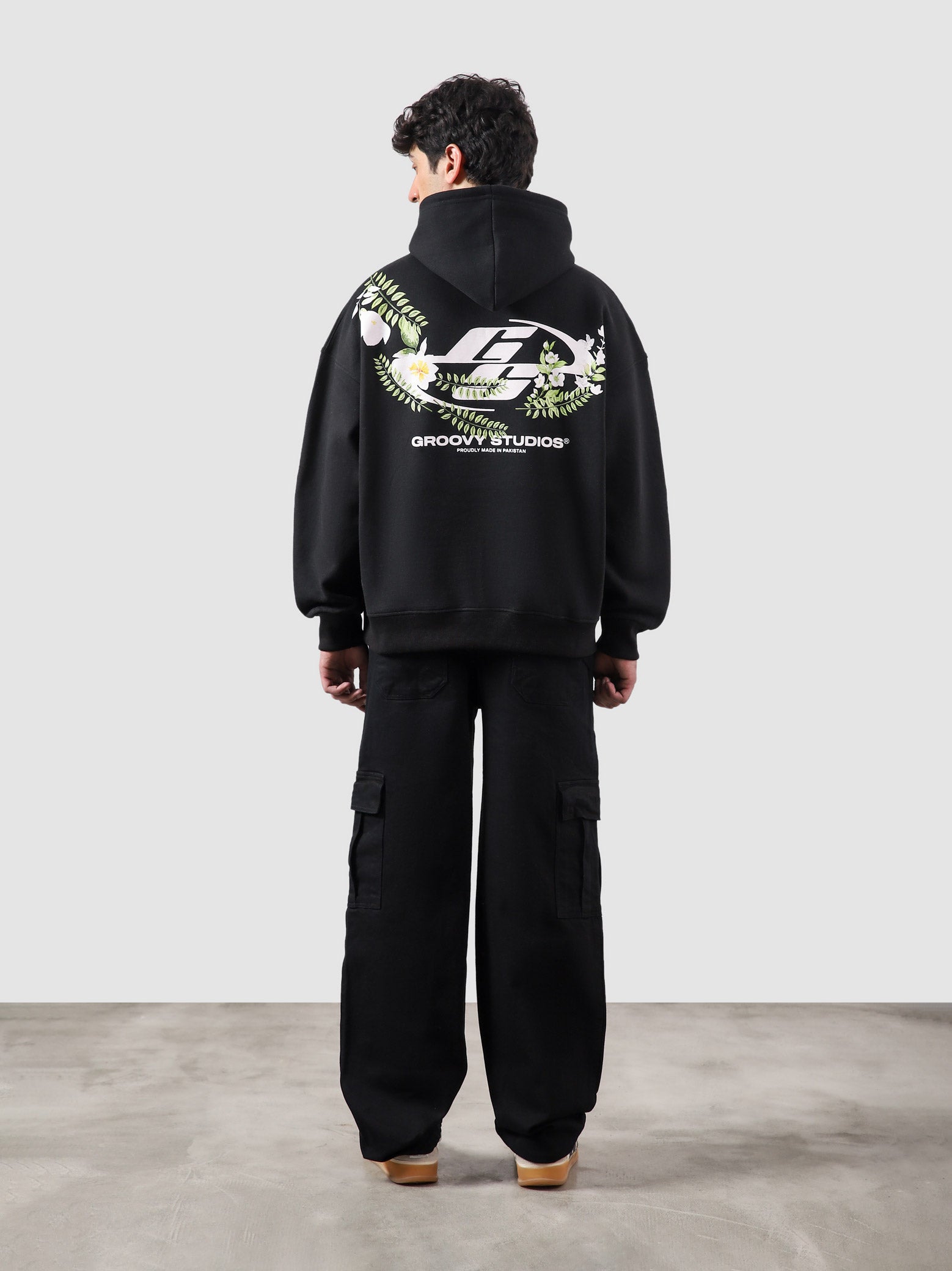 Floral hoodie female model front view oversized floral graphic Pakistan – GROOVY
