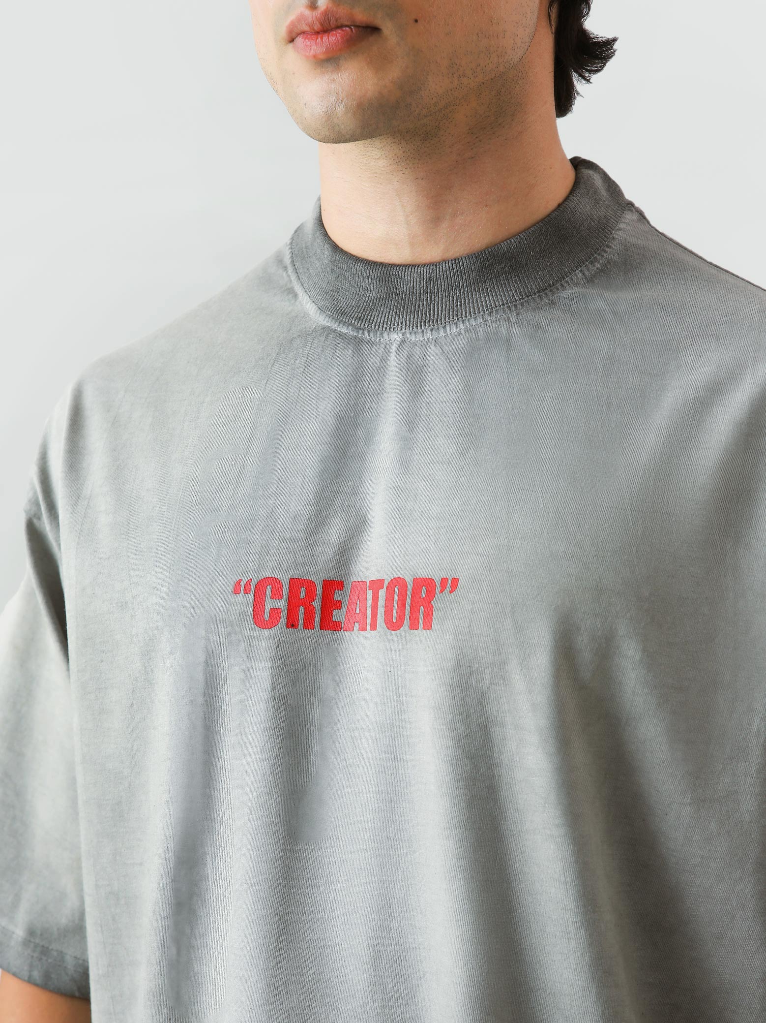 The Creator Tee male model side angle oil fade washed oversized Pakistan – GROOVY