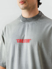 The Creator Tee male model side angle oil fade washed oversized Pakistan – GROOVY