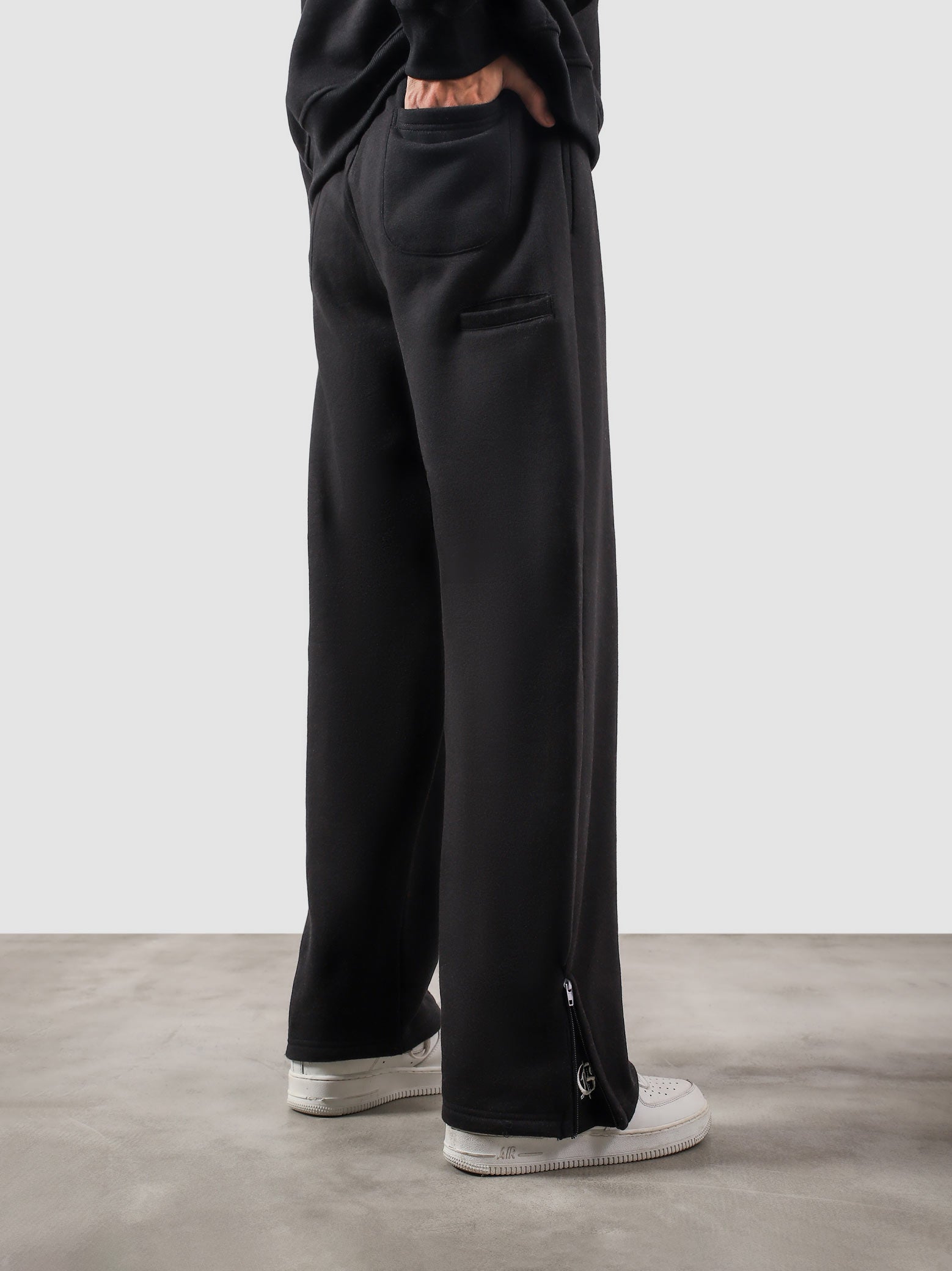 Utility Sweats black female model back view streetwear Pakistan – GROOVY