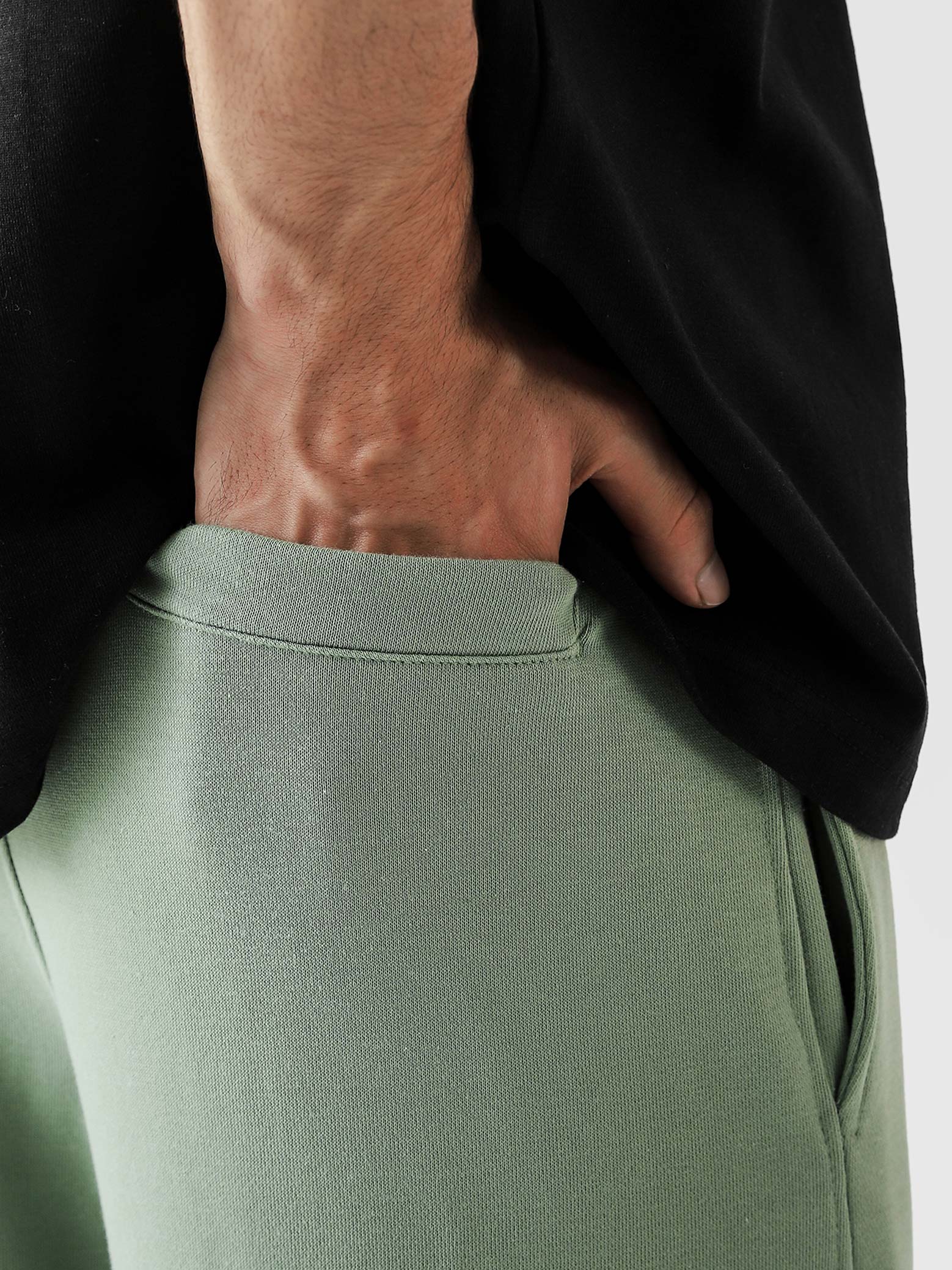 Sage green baggy trousers female model back view adjustable waistband Pakistan – GROOVY