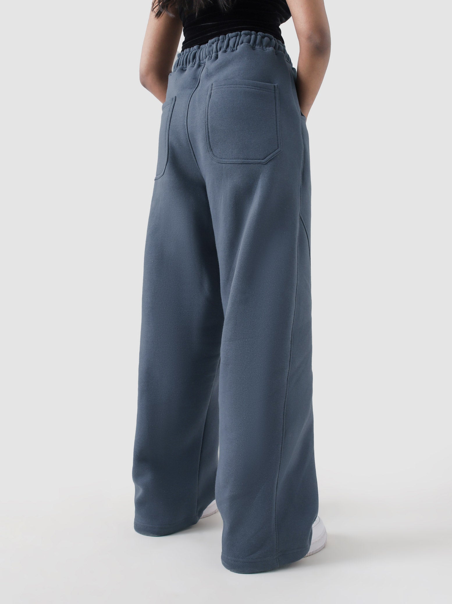Unity VI slate blue winter trouser female model back view baggy fit Pakistan – GROOVY