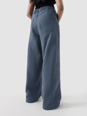 Unity VI slate blue winter trouser female model back view baggy fit Pakistan – GROOVY