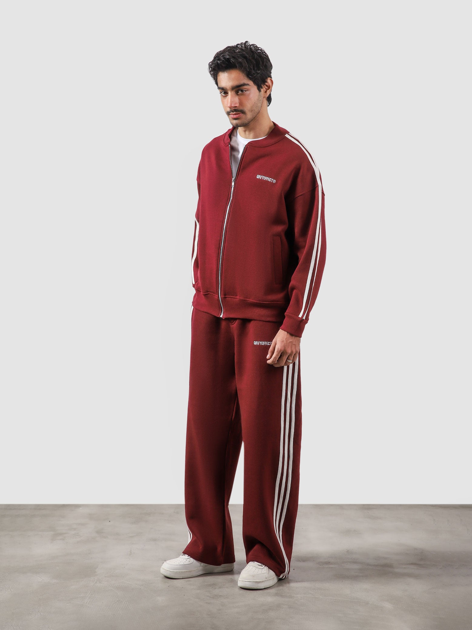 Heritage Top wine red female model back view contrast stripe track jacket Pakistan – GROOVY