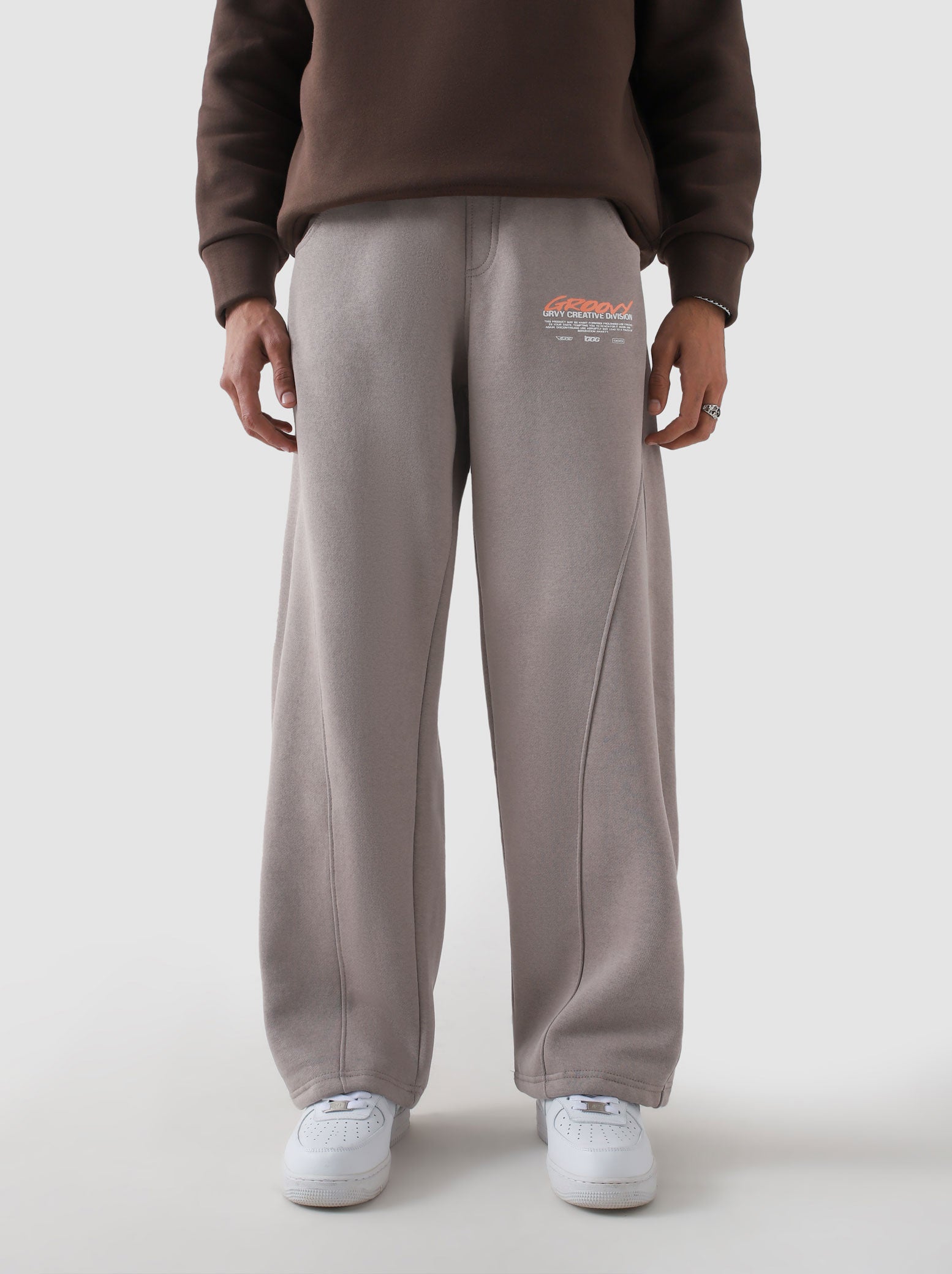 Unity VI sandstone winter trouser female model back view 300 GSM cotton Pakistan – GROOVY