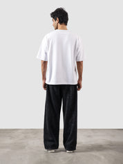 Reverse washed cargo pants couple lifestyle shot washed streetwear Pakistan – GROOVY