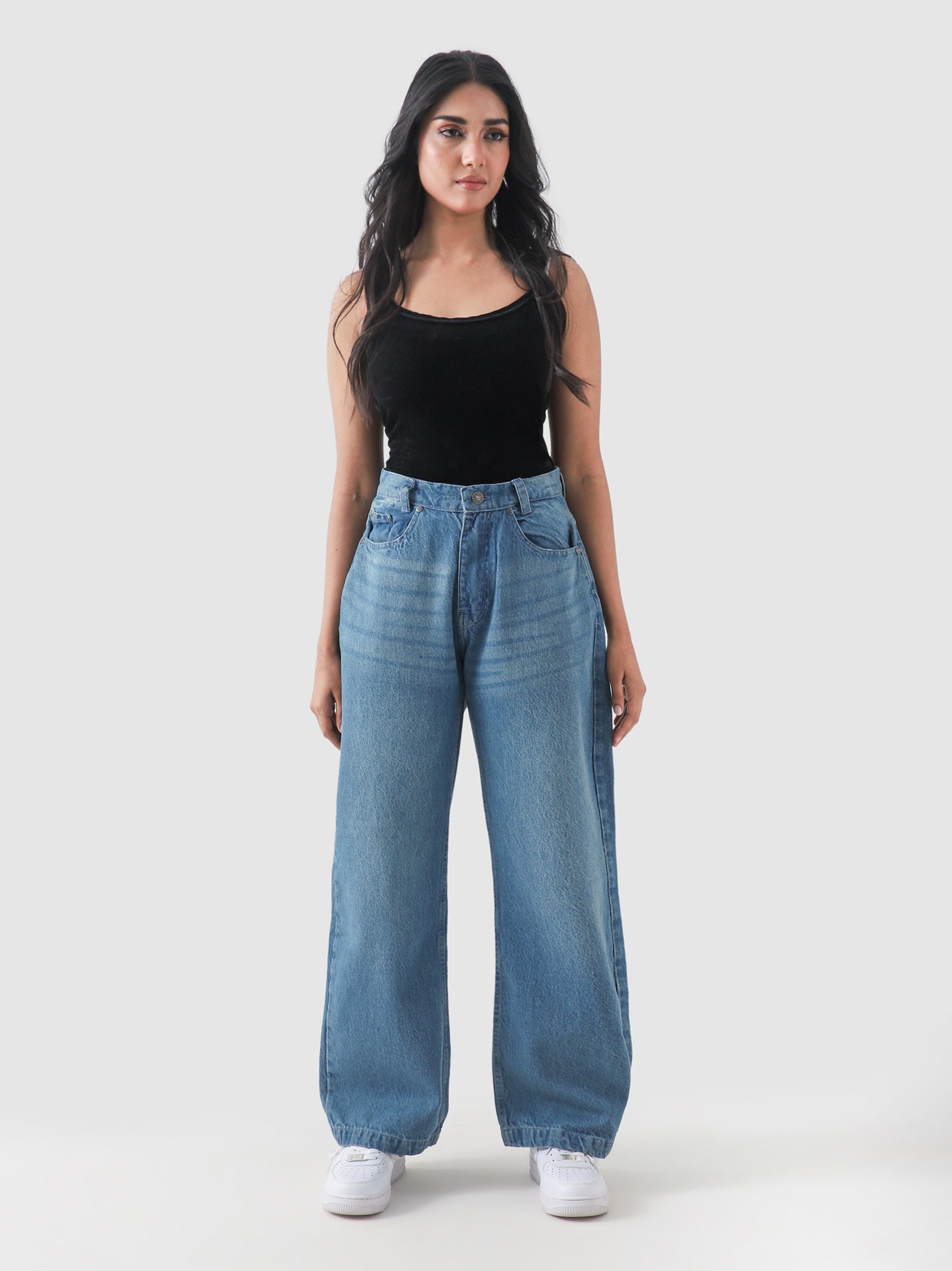 CORE denim washed blue jeans female model back view streetwear Pakistan – GROOVY