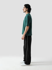 ZORO One Piece tee female model back view Zoro graphic racing green Pakistan – GROOVY