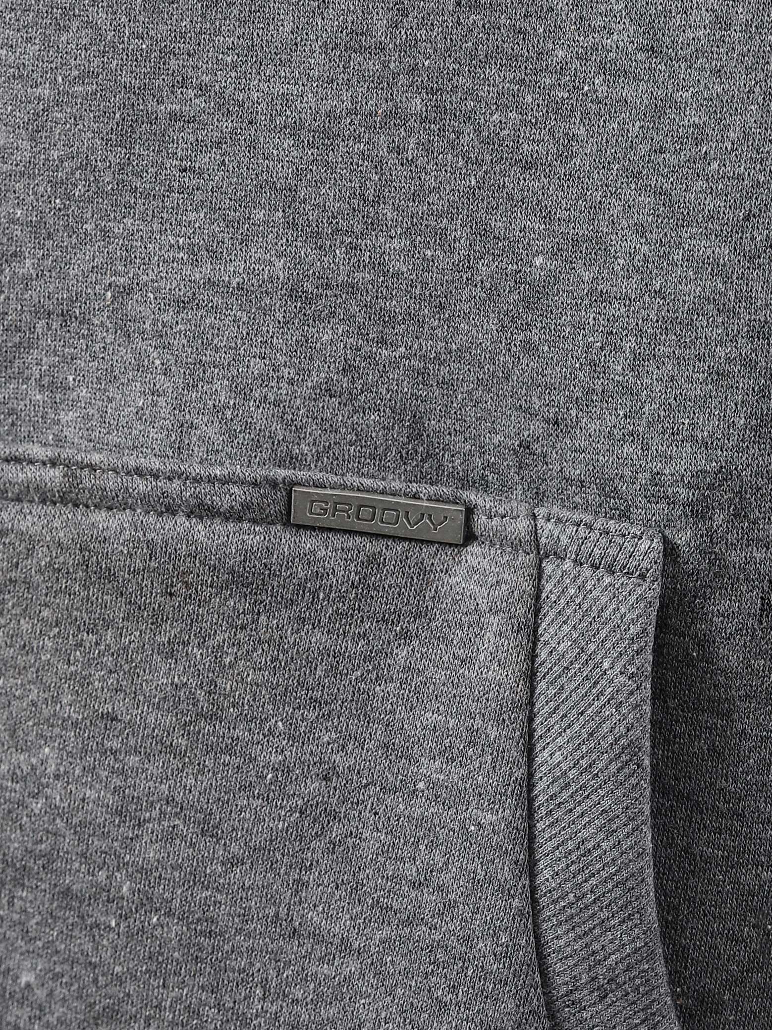 Dark heather grey essential zipper hoodie female model back view relaxed fit Pakistan – GROOVY