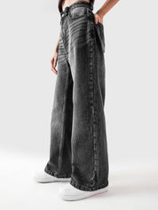 Rage denim female model back view washed black streetwear Pakistan – GROOVY