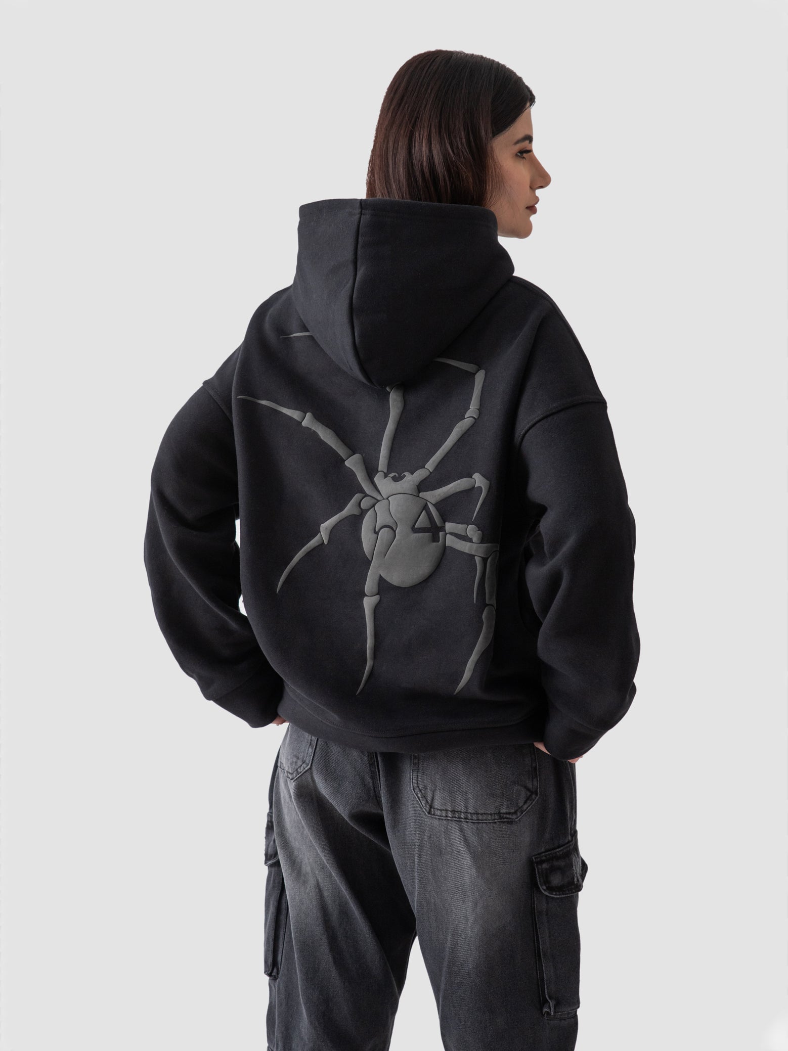 Hunter X Hunter hoodie male model seated lifestyle shot anime Pakistan – GROOVY