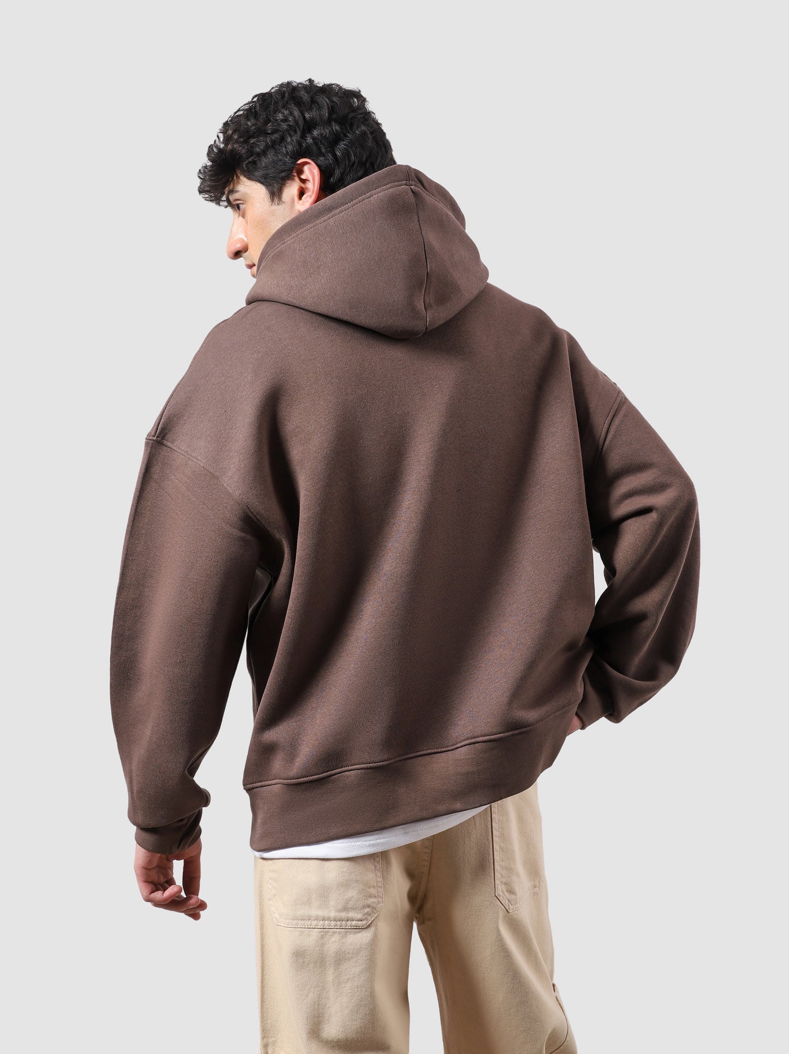 Maple brown essential zipper hoodie female model back view relaxed fit Pakistan – GROOVY