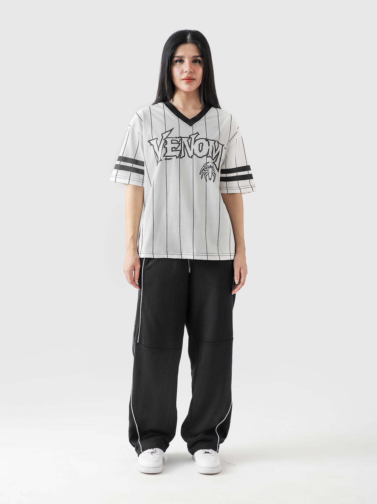 VENOM jersey white female model back view venom graphic streetwear Pakistan – GROOVY
