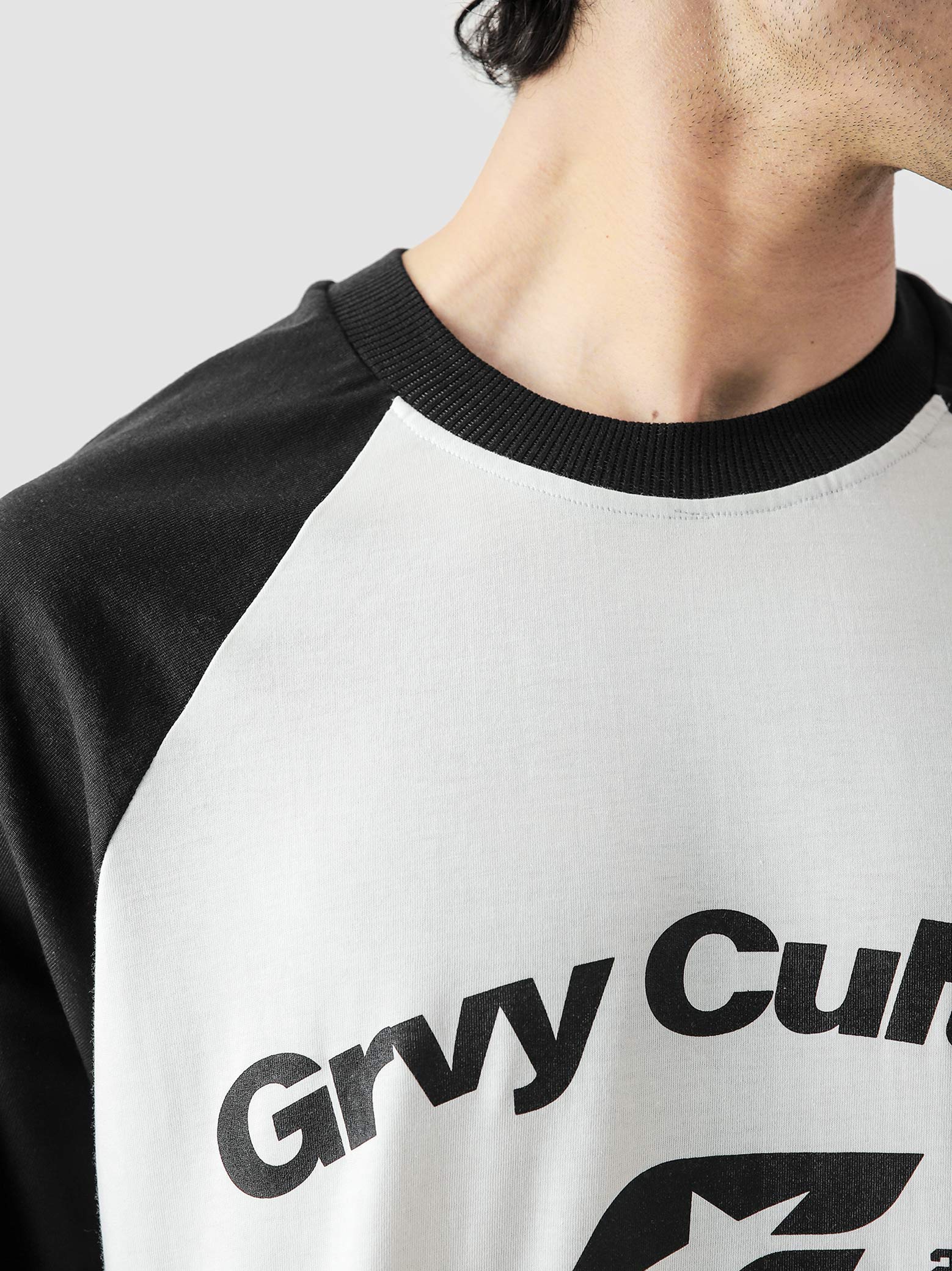 ROLLER TEE female model front view black white contrast sleeve Pakistan – GROOVY