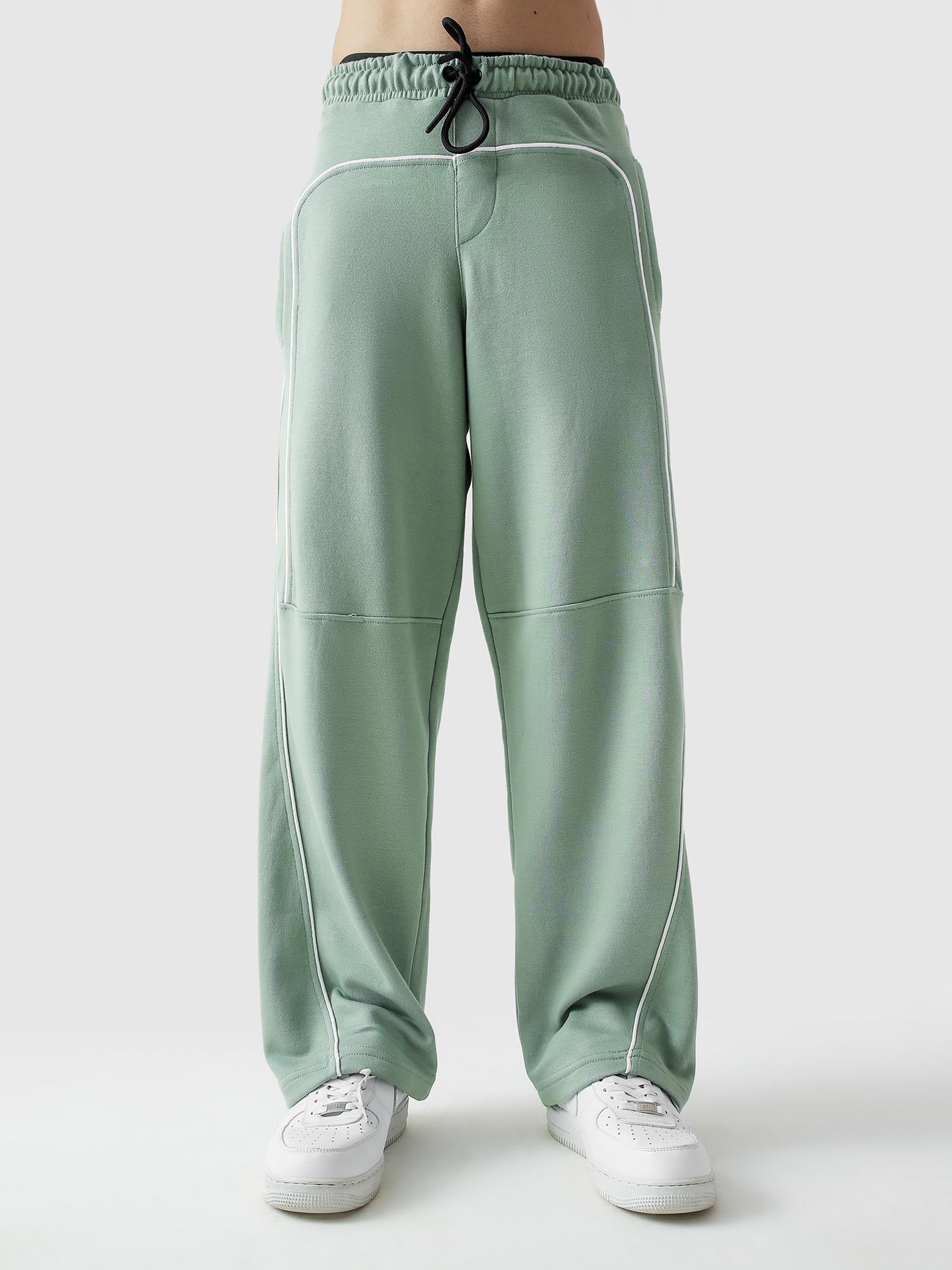 Piping trouser sage green female model back view contrast piping Pakistan – GROOVY